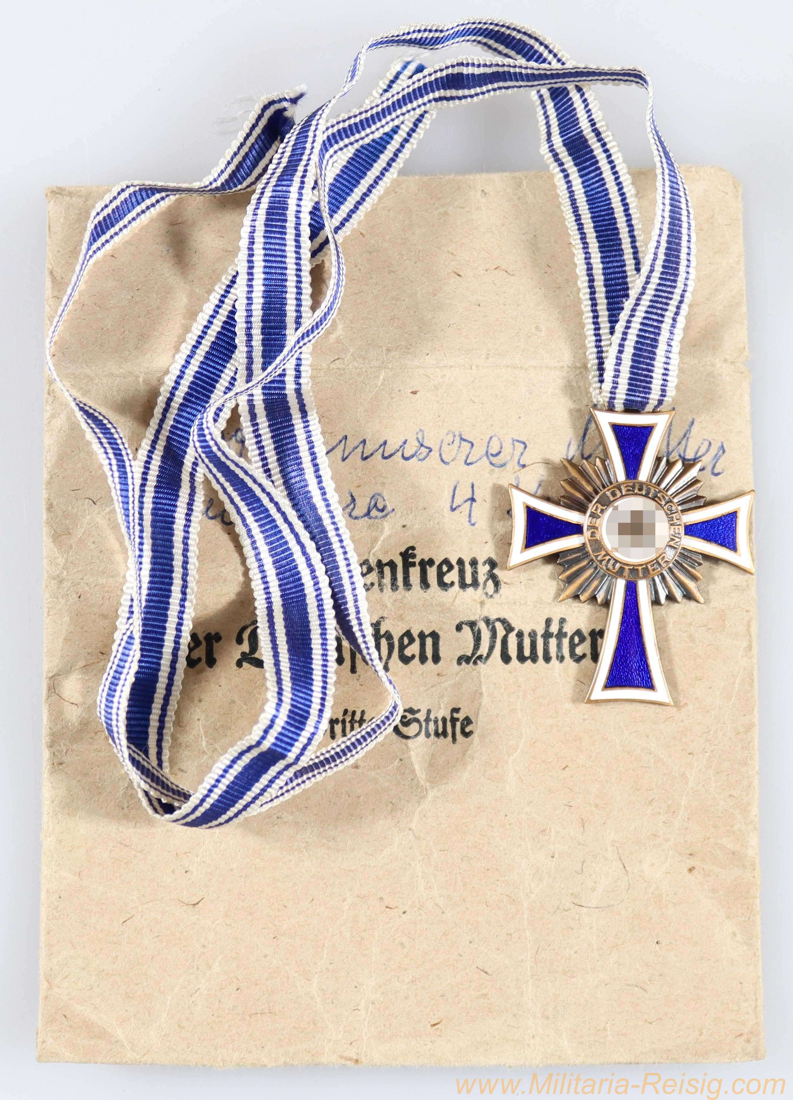 Mutterkreuz in Bronze mit Verleihungstüte, Hersteller Frank & Reif, Stuttgart