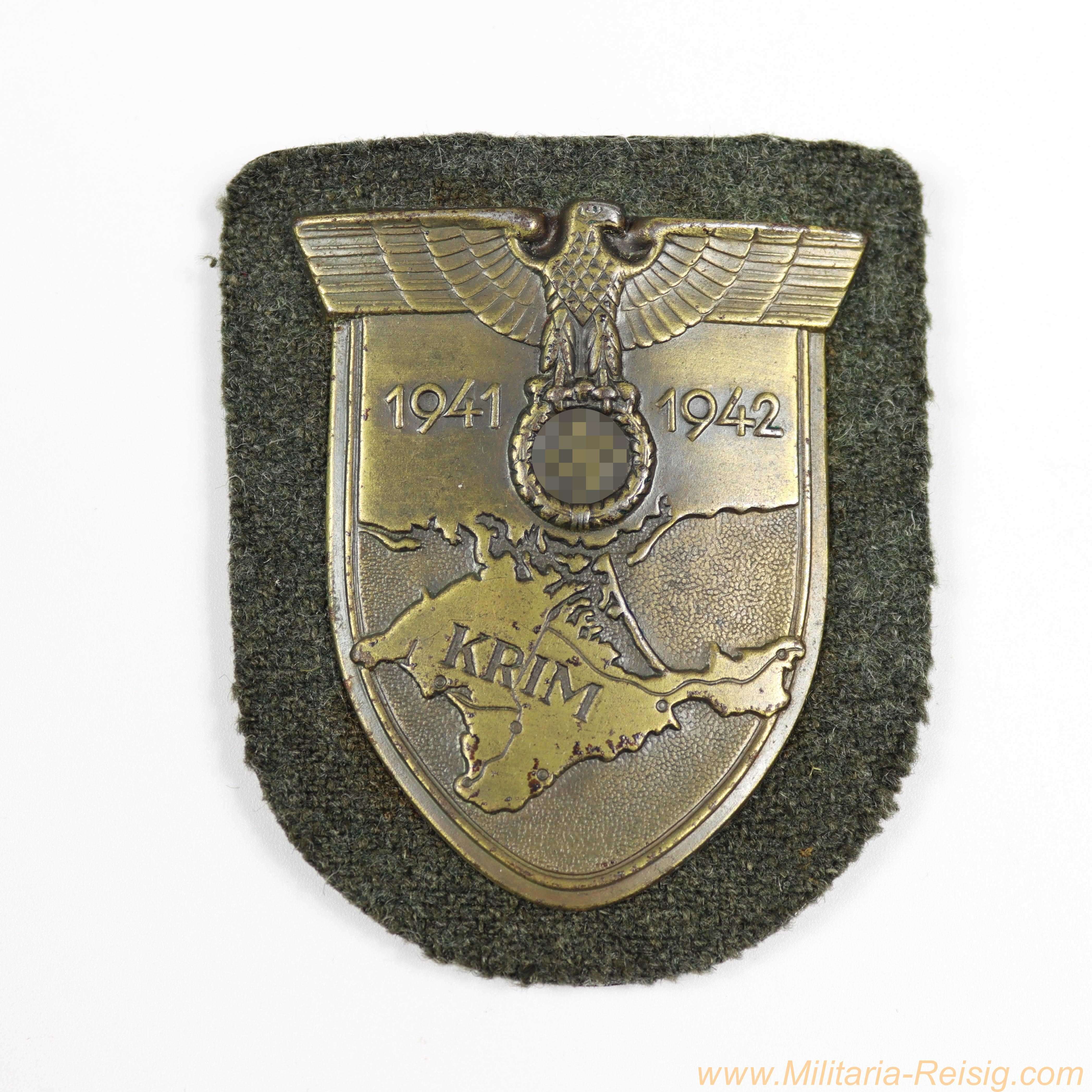 Krimschild Heer 1941/42 - bronziertes Eisenschild auf Heeresstoff