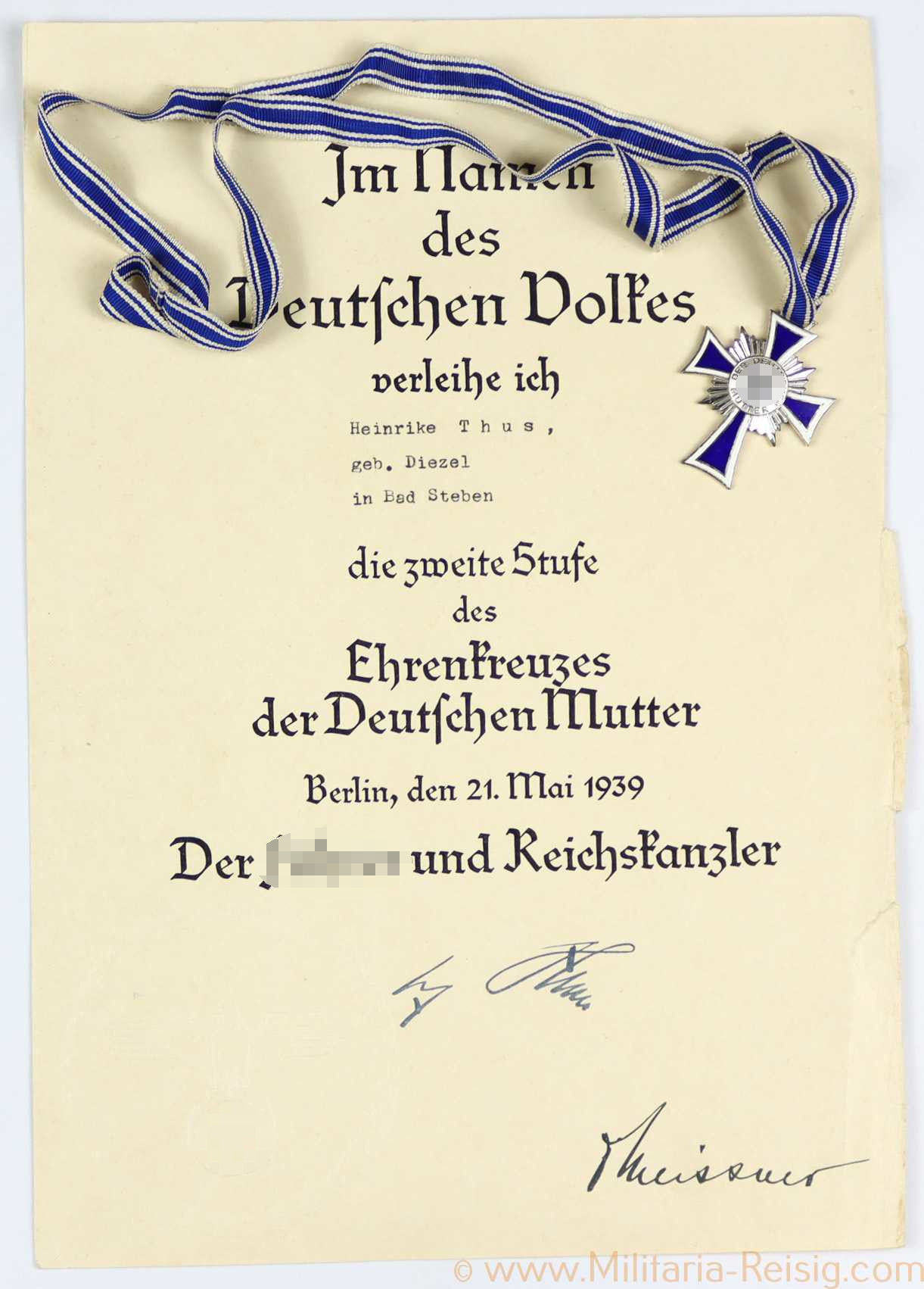 Mutterkreuz in Silber mit Verleihungsurkunde