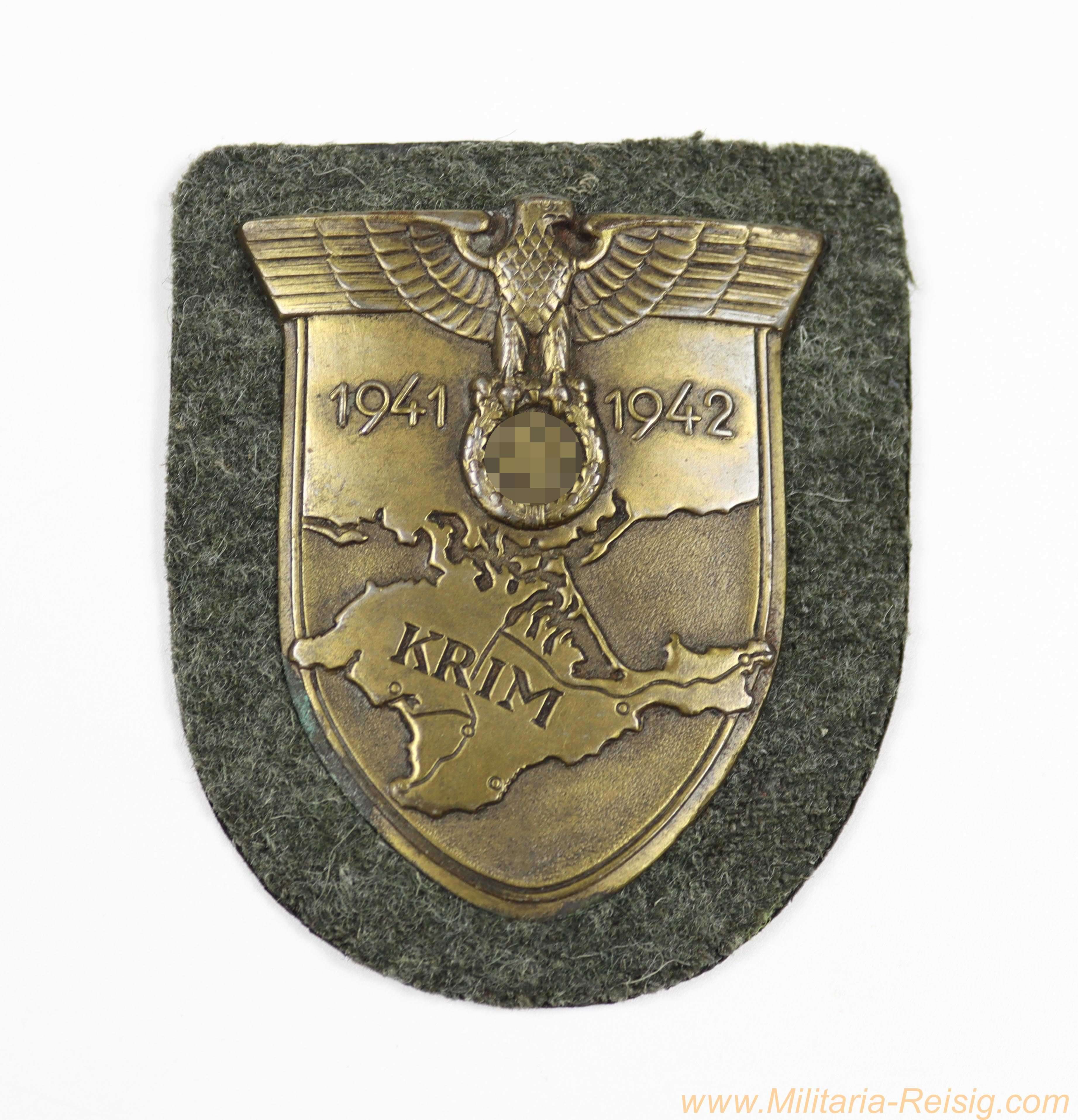 Krimschild Heer 1941/42 - bronziertes Eisenschild auf Heeresstoff