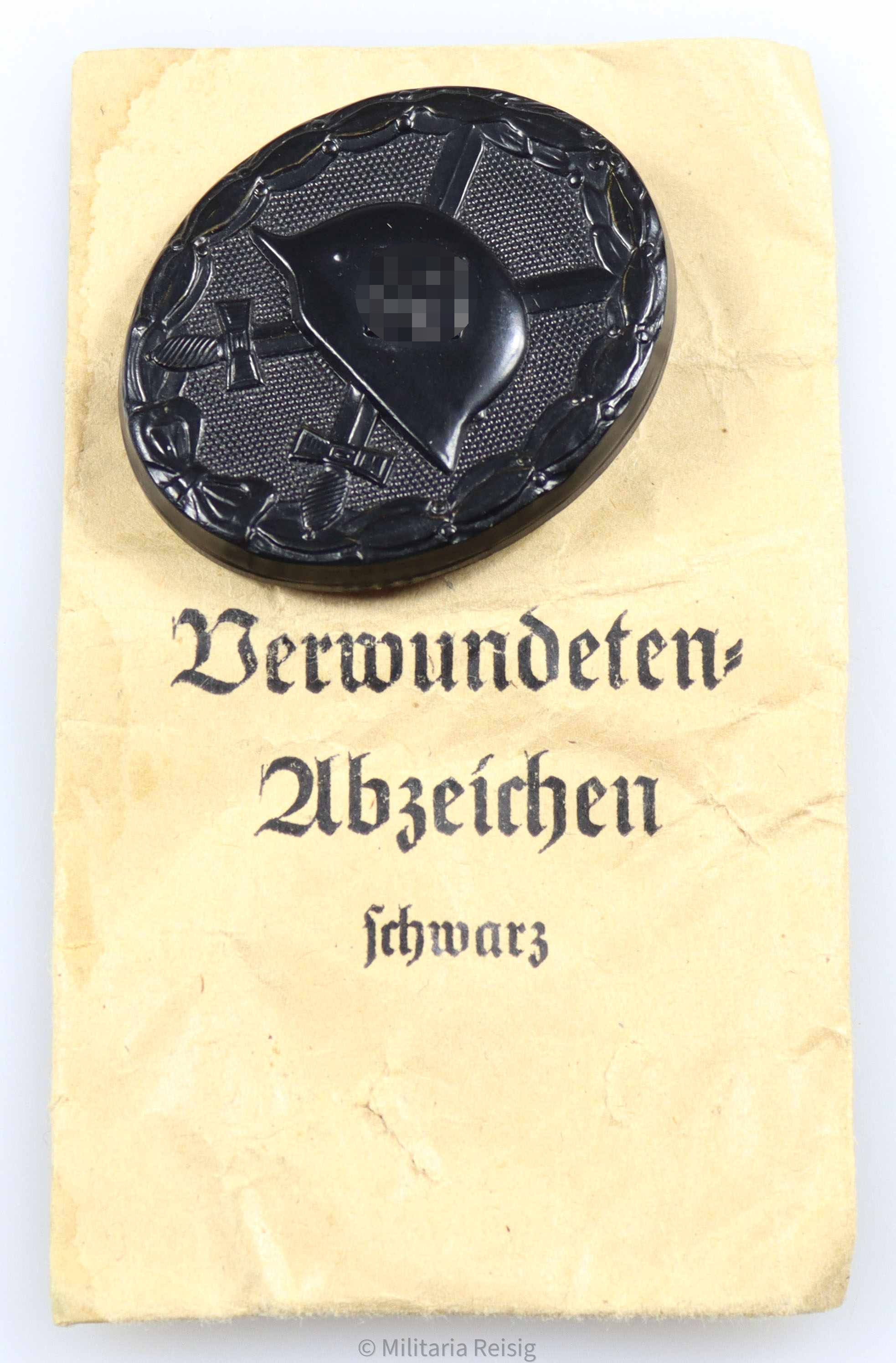 Verwundetenabzeichen in Schwarz 1939 mit Tüte, Hersteller Fritz Kohm, Pforzheim