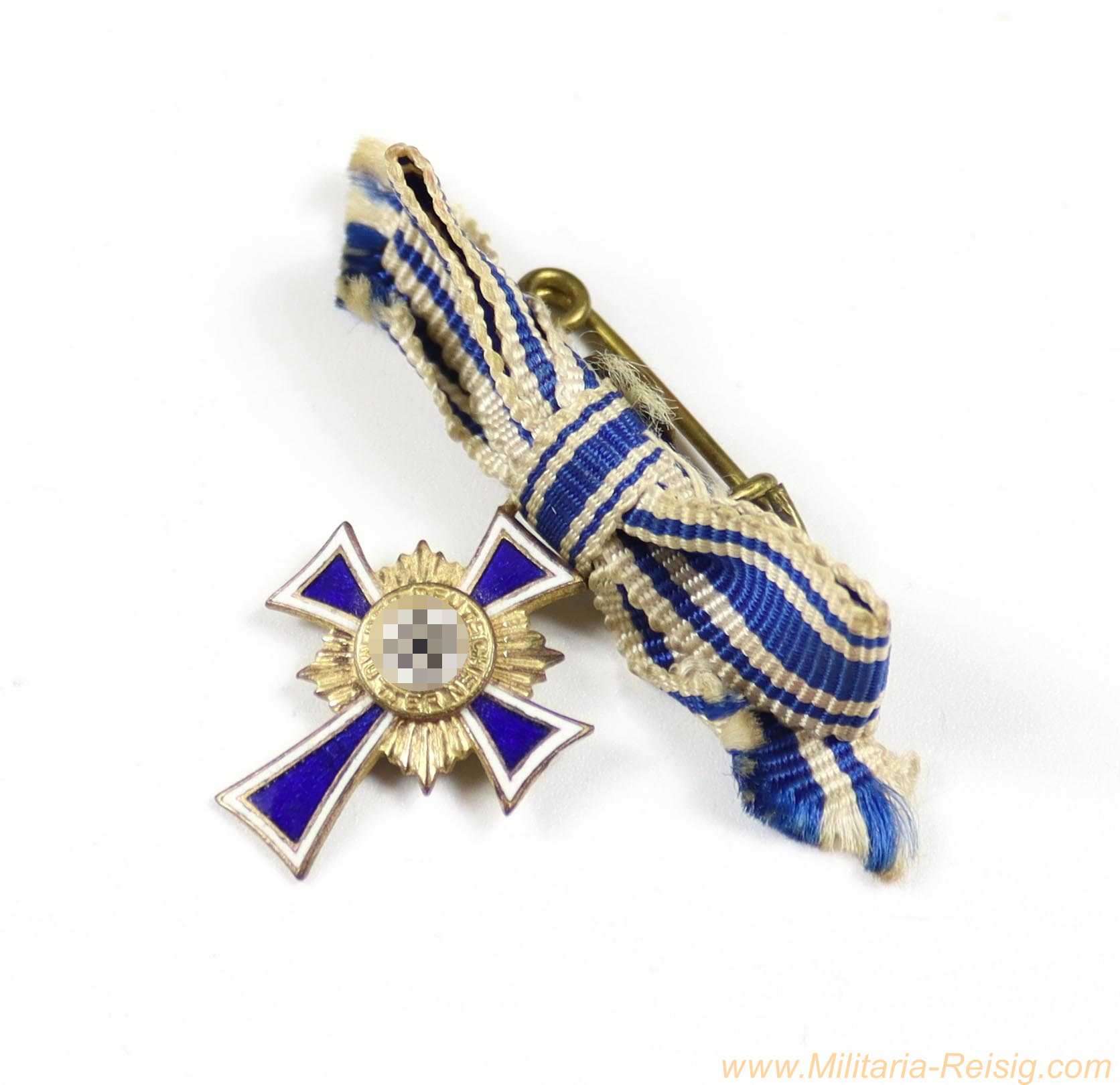 Miniatur des Ehrenkreuzes der Deutschen Mutter in Gold an Damenschleife, Hersteller L/54 (Schauerte & Höhfeld, Lüdenscheid)
