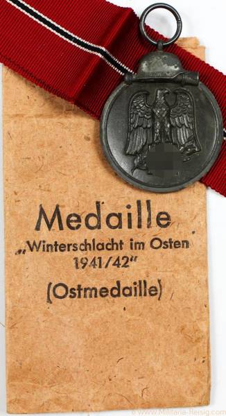 Ostmedaille mit Verleihungstüte, Herst. 4 (Steinhauer & Lück, Lüdenscheid)