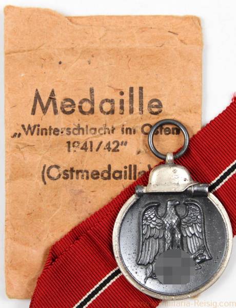 Ostmedaille mit Verleihungstüte, Herst. 65 (Klein & Quenzer, Oberstein)